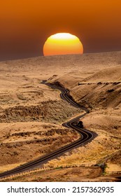 Sunrise Over A Winding And Curvey Road In Eastern Washington High Desert Country