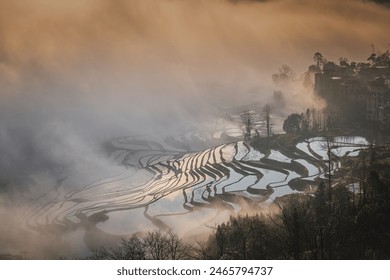 Sunrise over YuanYang rice terraces in Yunnan, China, one of the latest UNESCO World Heritage Sites - Powered by Shutterstock