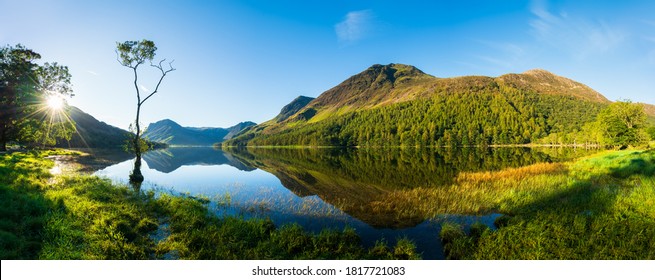 Sunrise panorama of Buttermere lake in the Lake District. England
