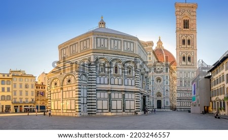 Sunrise panorama of Santa Maria del Fiore cathedral in Florence, Italy. Architecture and landmark of Florence. Travel background.