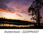 Sunrise at Paul B Johnson State Park near Hattiesburg, Mississippi over the lake. Download now!