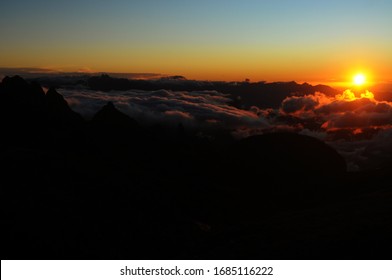 Sunrise At Pedra Do Açú (2,245m) In The Serra Dos Órgãos National Park, At The Most Point Of The City Of Petrópolis.