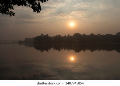 Sunrise, reflection from lake at morning
