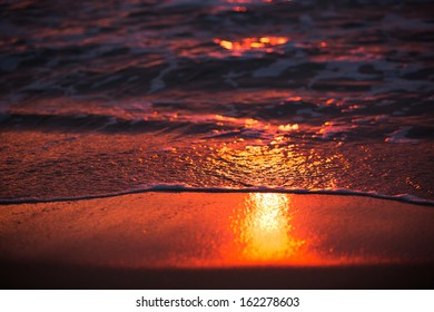 Sunrise reflection on waves