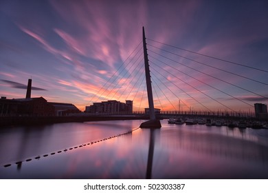 Sunrise at the River Tawe and the Millennium bridge in Swansea