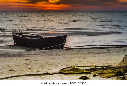 Sunrise at sandy beach of Baltic Sea near village of fishermen - Powered by Shutterstock