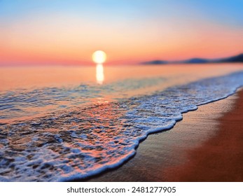 Sunrise sea beach, sunset on ocean tropical island, blue water, tide wave splash closeup, soft color blurred background, pink red sky, sun reflection, peaceful relaxed dawn landscape, summer holidays - Powered by Shutterstock