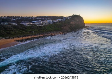 Sunrise seascape with clear skies and waves at Copacabana on the Central Coast, NSW, Australia.