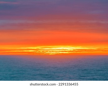 Sunrise seascape with cloud covered sky at Shelly Beach on the Central Coast, NSW, Australia. - Shutterstock ID 2291336455