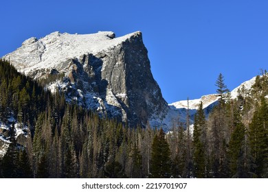 Sunrise And Shadows Hit The Snow-dusted North Face Of Hallett Peak Along The Continental Divide - Rocky Mountain National Park, Colorado, USA