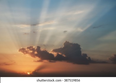 Sunrise Sky With God Rays And Two Sides - Red And Blue, Good And Bad Concept