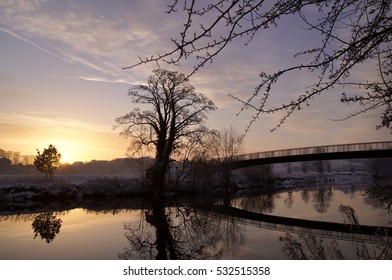 Sunrise In Snow Over River At Wetherby