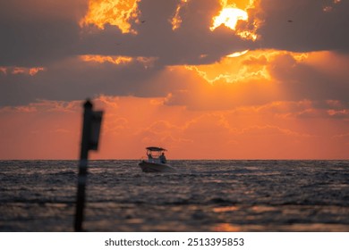 sunrise with speedboat yacht sails slowly in the sea at sunset.... - Powered by Shutterstock