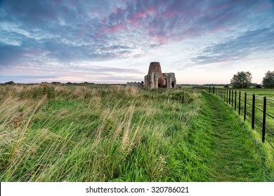 Sunrise At St Benet's Abbey On The Norfolk Broads, All That Remains Are The Ruins Of The Gatehouse And Windmill