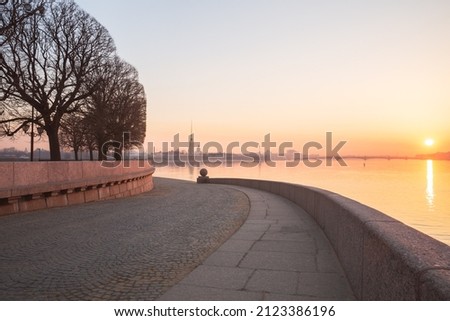 Sunrise in St. Petersburg. The Spit of Vasilevsky Island and the Peter and Paul Fortress in the early morning at dawn. Cityscape in pastel colors