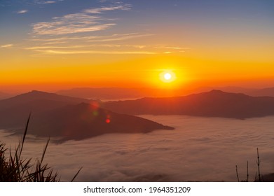 Sunrise Or Sunset Landscape Of The Mountain And Sea Of Mist In Winter Sunrise View From Top Of Doi Pha Tang Mountain , Chiang Rai, Thailand