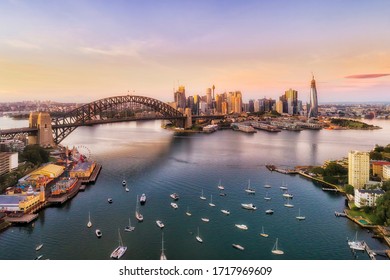 Sunrise In Sydney City - Aerial View From Lavender Bay To The Sydney Harbour Bridge And CBD Skyline.