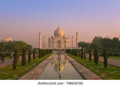 Sunrise at Taj Mahal (Crown of the Palace) is a  is an ivory-white marble mausoleum on the south bank of the Yamuna river in the Indian city of Agra. It is one of the Seven Wonders of the world.