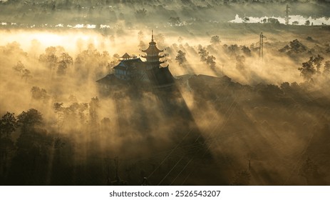 The sunrise in the tea fields with the temple is extremely beautiful