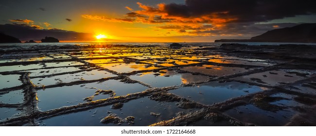 Sunrise at Tessellated Pavement State Reserve Tasmania Australia - Shutterstock ID 1722164668