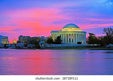 Sunrise at the Thomas Jefferson Memorial in Washington DC. The famous cherry trees are in full bloom. - Powered by Shutterstock