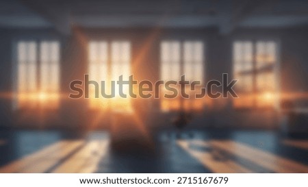 Sunrise through loft windows with casting long shadows.