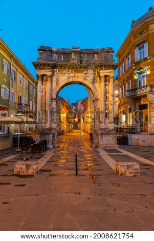 Sunrise view of Arch of the Sergii at Croatian town Pula