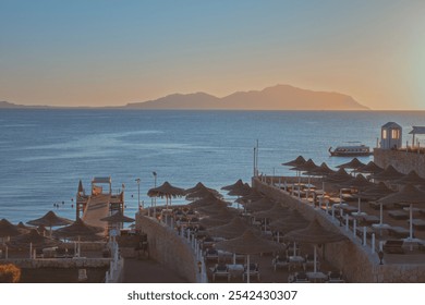 Sunrise View of Beach Resort with Pier - Powered by Shutterstock