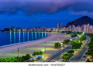 Sunrise view of Copacabana beach and Avenida Atlantica in Rio de Janeiro, Brazil. Copacabana beach is the most famous beach of Rio de Janeiro, Brazil. Skyline of Rio de Janeiro.