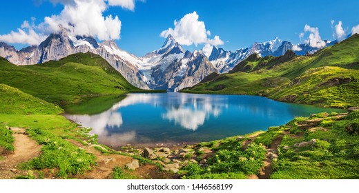 Sunrise view on Bernese range above Bachalpsee lake. Popular tourist attraction. Location place Swiss alps, Grindelwald valley, Europe.