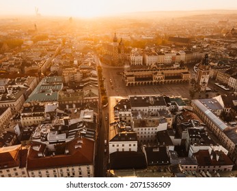 Sunrise view on Krakow main square and streets. Cracow, Lesser Poland province. St. Mary's Basilica, Rynek Glowny, Wawel castle