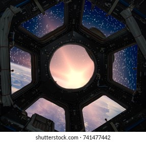 Sunrise, view from spaceship. Elements of this image furnished by NASA.