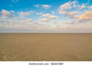 Sunrise at the wadden sea of Sankt Peter Ording, North Sea in Germany - Shutterstock ID 583457887