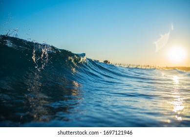 sunrise and waves at sea