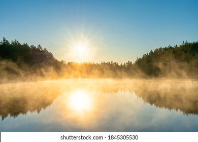 Sunrsise at the lake with morning fog - Powered by Shutterstock