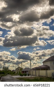 the sun's rays through cloudy sky