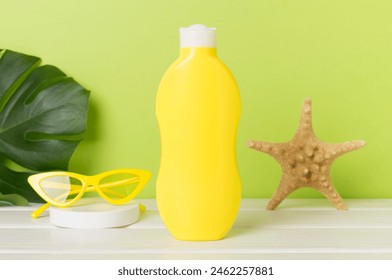 Sunscreen lotion with summer decor on table - Powered by Shutterstock