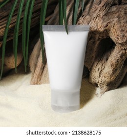 Sunscreen Mockup. Sunblock Cream On Sandy Beach. Blank White Cream Container. Beauty Product For Summer Skin Protection.