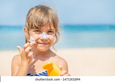 Sunscreen On The Skin Of A Child. Selective Focus.