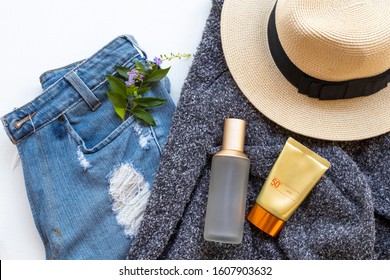 Sunscreen Spf50 ,toners Serum Therapy Cosmetics Health Care For Skin Face With Knitting Wool Sweater ,jean Pants Of Lifestyle Woman In Winter Season Arrangement Flat Lay Style
