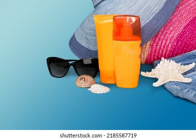 Sunscreen Tube Mockup On Blue Background. Sun Safety, Infant Sun Protection Concept.