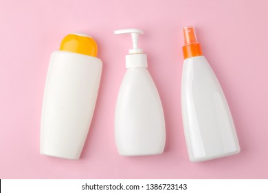 Sunscreen. various sunscreens on a bright pink background. summer. vacation. Sun protection. top view
