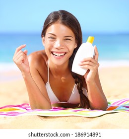 Sunscreen Woman Applying Suntan Lotion Showing Stock Photo