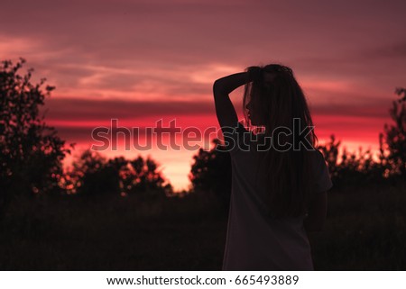 Similar – Hand am Hinterkopf, Frau, Sonnenuntergang