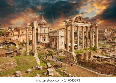 Sunset above Ancient Ruins of Rome - Imperial Forum - Italy