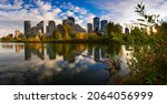 Sunset above city skyline of Calgary with Bow River, Alberta, Canada, photographed from Prince