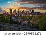 Sunset above city skyline of Calgary with Bow River, Alberta, Canada.