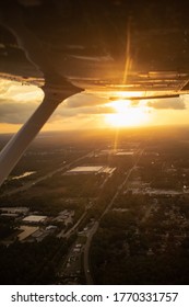 Sunset From Above. Inside Small Plane