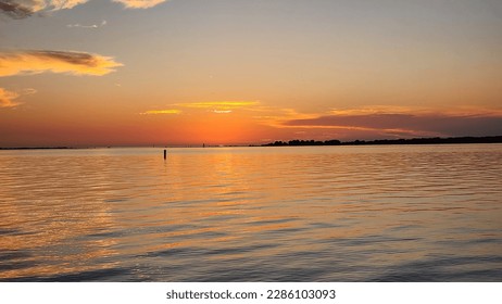 sunset after glow and calm waters