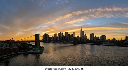Sunset afterglow of the Brooklyn Bridge and New York City skyline at New York
